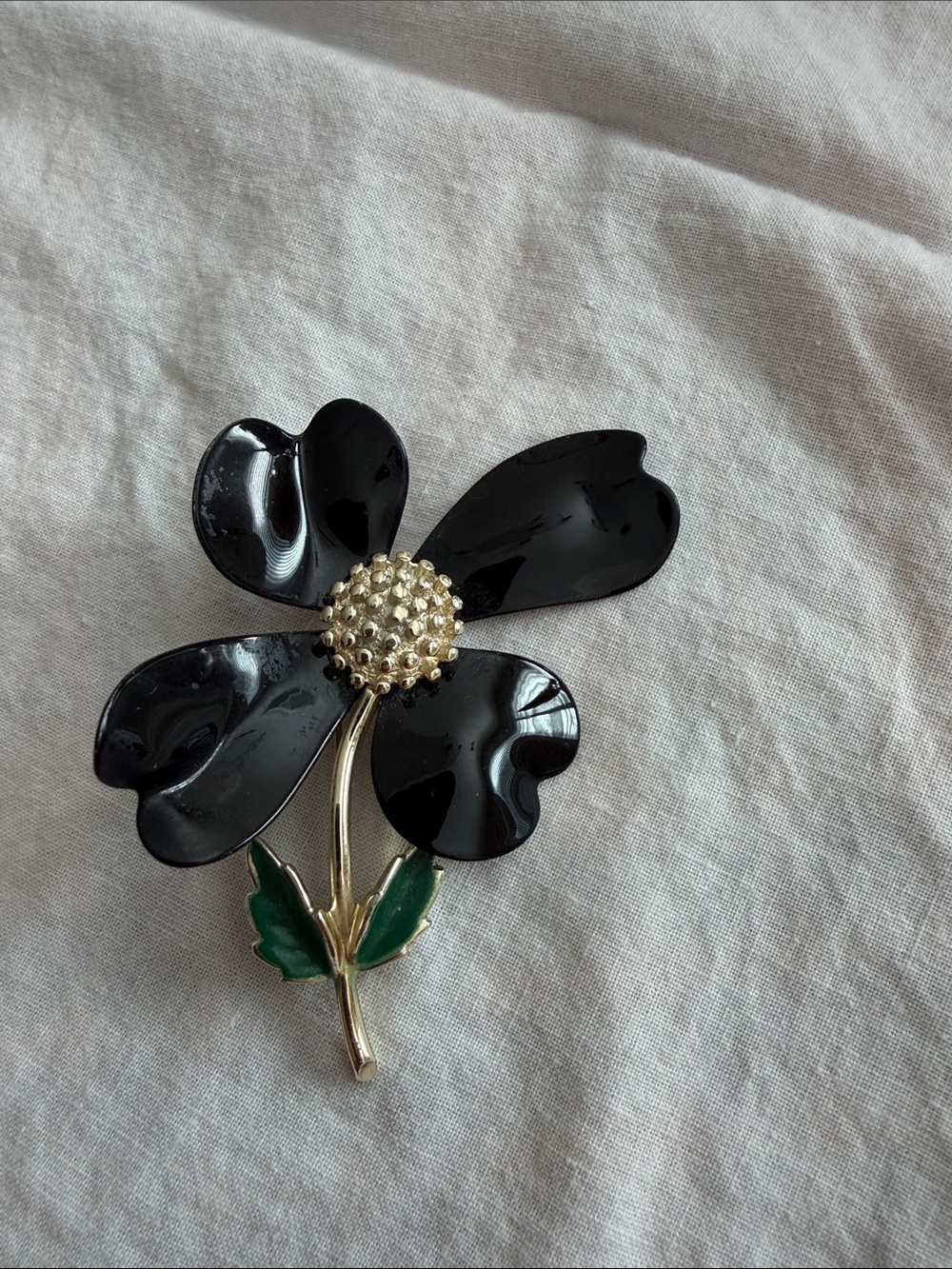 Sarah Coventry Black Enamel Flower Brooch with Green Leaves